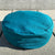 Side view of Teal Meditation Cushion